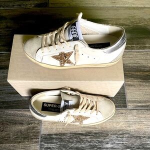 Golden Goose super star leather glitter low top-top sneakers.